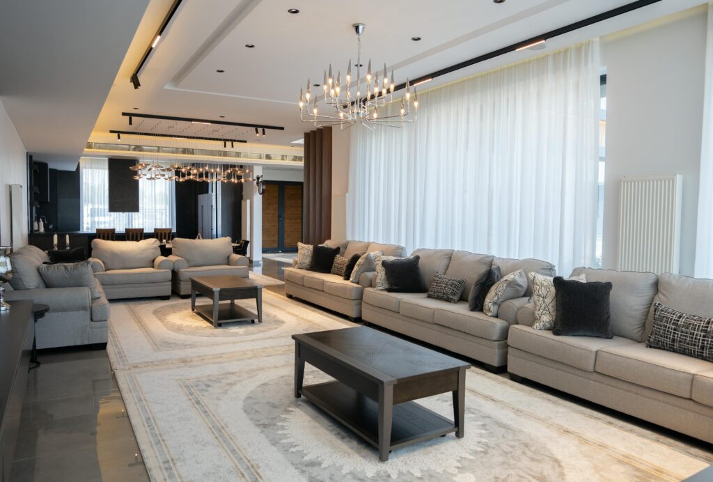 "Comfortable sofa and carpet in a room with a curtain in Riyadh.